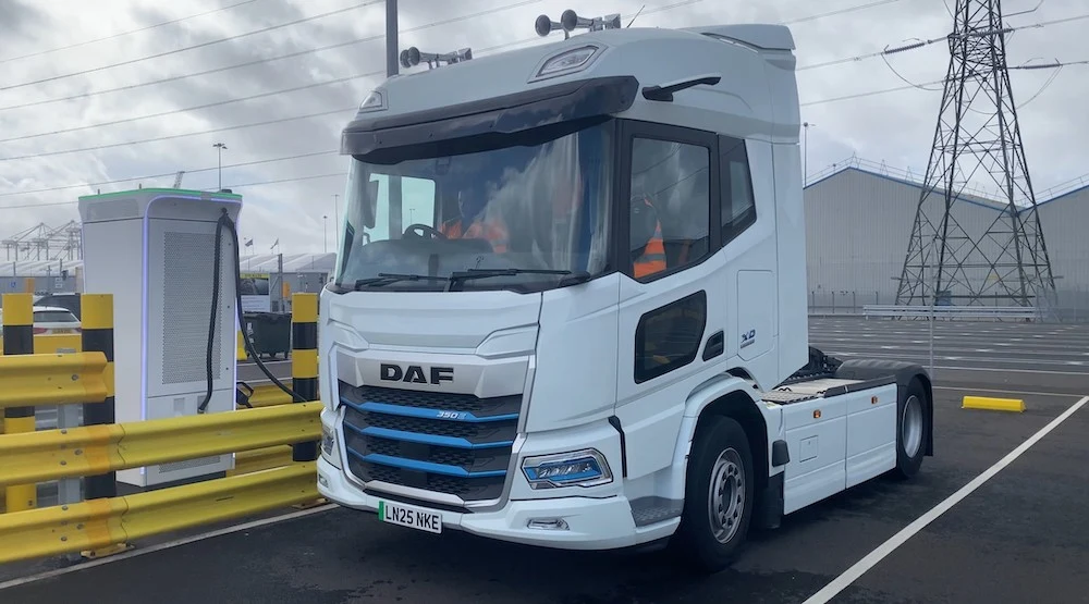 Electric DAF HGV tractor unit beside an HGV charger at DP World Southampton on the EVITA trial