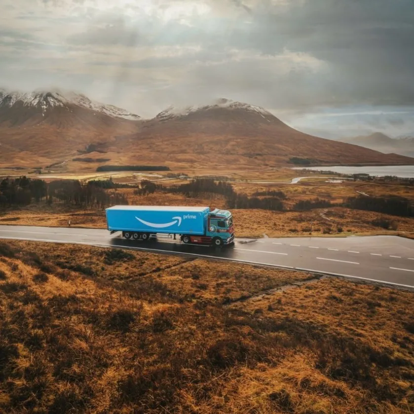 Amazon Prime HGV travelling through a Highland landscape, illustrating HGV operations across Scotland from Dynamon ZERO Transport Scotland HGV Readiness Fund case study
